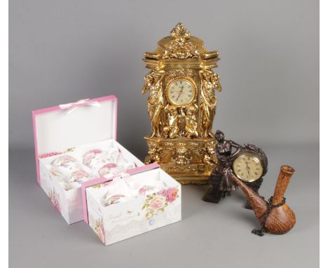 Crosa mantel clock in gold with smaller Juliana clock as well as a leather wrapped Porron wine decanter missing top and Londo