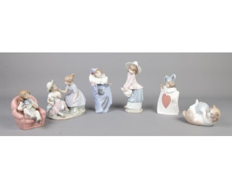 Six Nao by Lladro ceramic figures, including cat with ball of string and mother and child on chair.  Third figure has a chip 