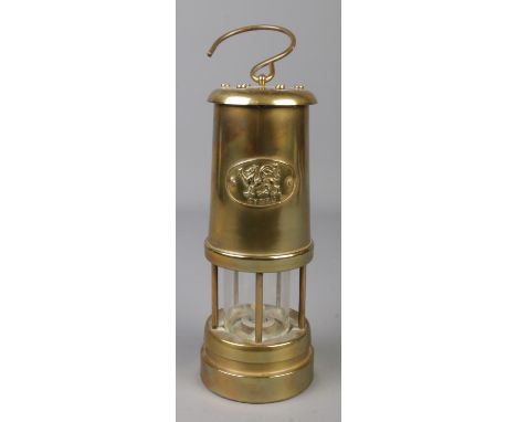 A brass miners safety lamp bearing Welsh Dragon insignia, Cymru.  