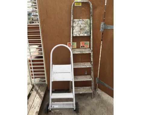 A FIVE STEP ALLOY STEP LADDER AND A WHITE TWO STEP TROLLEY/STACK TRUCK 