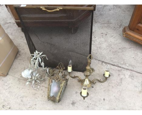 THREE ORNATE LIGHT FITTINGS AND A FIRE GUARD 