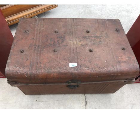 A VINTAGE METAL TRAVELLING TRUNK WITH BLUE INTERIOR 