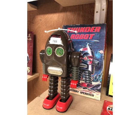 A VINTAGE BOXED 'THUNDER ROBOT' BATTERY OPERATED MODEL 