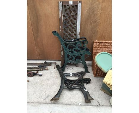 TWO PAIRS OF CAST IRON BENCH ENDS AND A BENCH BACK 