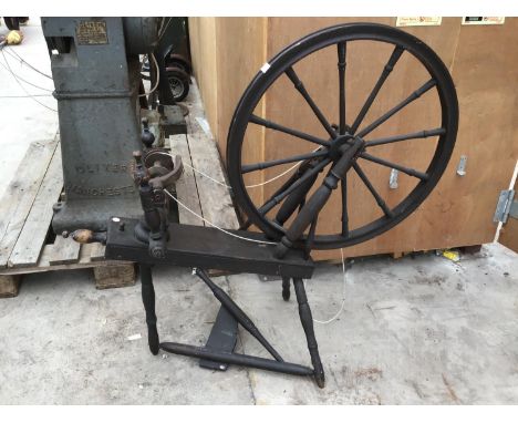 A VINTAGE SPINNING WHEEL 