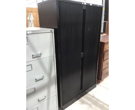 A BLACK OFFICE FILING CABINET WITH ROLLER DOORS 