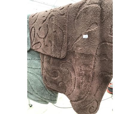 A FOUR PIECE CARAVAN CARPET SET (BROWN) 