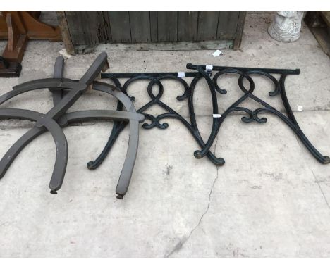 A PAIR OF CAST IRON BENCH ENDS AND A PAIR OF MODERN BENCH ENDS 
