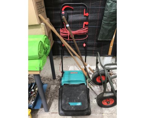 A BOSCH ELECTRIC LAWN MOWER AND VARIOUS GARDENING TOOLS 