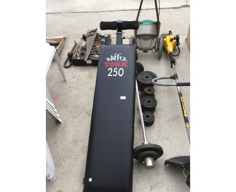 A YORK 250 WEIGHT BENCH WITH BAR AND WEIGHTS 