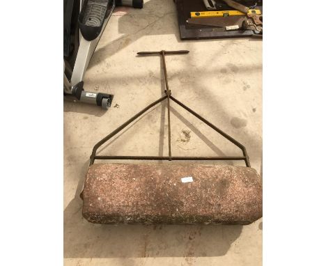 A VINTAGE CONCRETE GARDEN ROLLER 