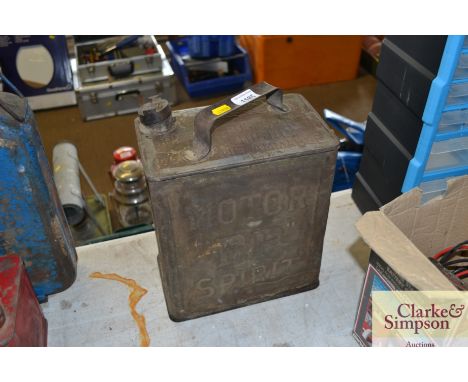 A BP fuel can with brass top