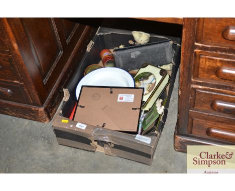 A box of various sundry items to include enamel dish; various tins; optics; picture frames etc