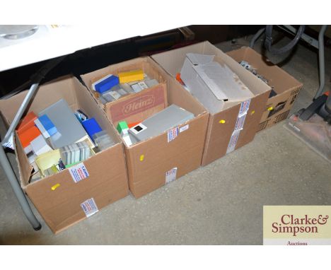 Four boxes of various projector slides etc