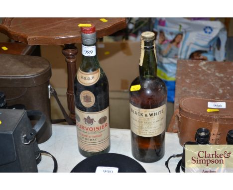 A vintage bottle Courvoisier, together with a bottle of Black &amp; White Special Blend of Choice old Scotch Whisky