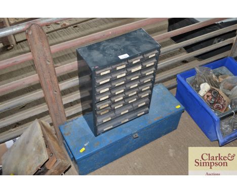 A metal toolbox and a metal multi-drawer screw box cabinet