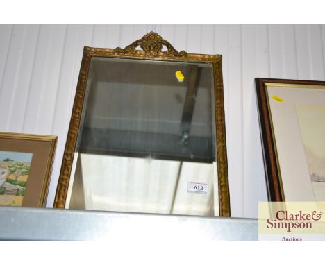 A bevel edge framed wall mirror