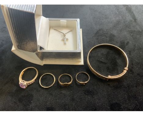 A 9ct gold and amethyst and diamond ring. Marked 375, Dia. Size k. Childrens gold rings a rolled gold bracelet etc.  
