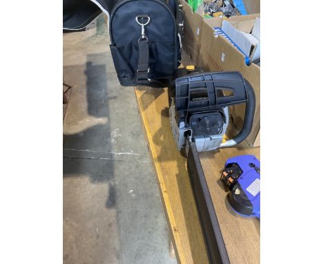 A petrol chainsaw with carry case