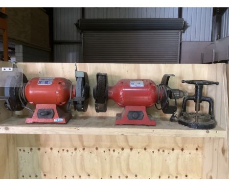 Two bench grinders and a punch press