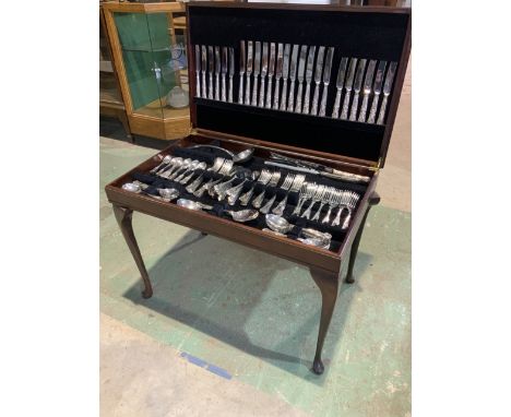 A silver plated canteen of Sheffield cutlery with inset leather top. W:76cm x D:47cm x H:57cmSet is incomplete: one teaspoon 