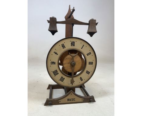A Buco Swiss Baumann ltd tick tock wooden  mantle clock.