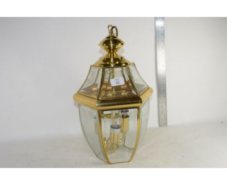 LIGHT FITTING WITH BRASS MOUNTS