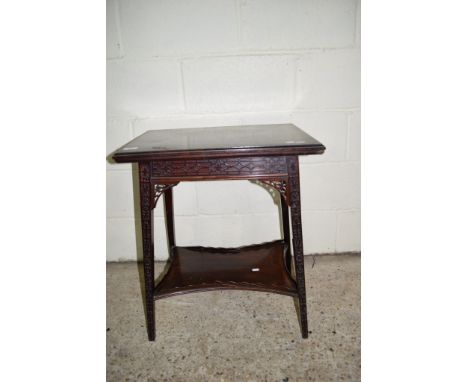 SMALL GOOD QUALITY EASTERN HARDWOOD FOLD-TOP TABLE WITH GALLERIED SHELF BENEATH AND CARVED AND FRETWORK DECORATION THROUGHOUT