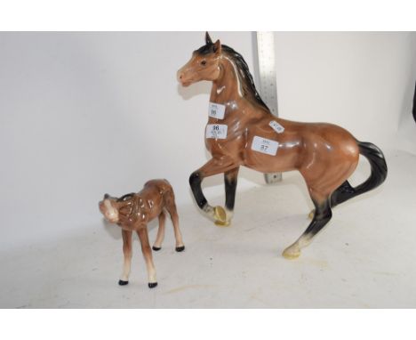 PAIR OF CERAMIC HORSES BY MELBA