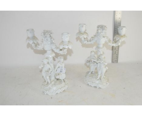 PAIR OF PORCELAIN BLANC DE CHINE CANDELABRA MODELLED IN MEISSEN STYLE