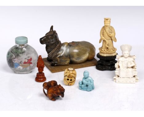 An Indian horn Khandari bull a Chinese snuff bottle, netsuke and a few other small pieces