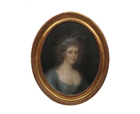 Late 18th Century English School half lengh portrait of a lady in blue dress, pastels, 63cm x 51cm