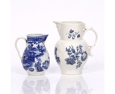 A Worcester blue transfer jug circa 1770 with mask spout, 14.5cm and one other blue transfer cream jug, 11.5cm (2)