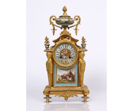 A 19th Century French mantel clock the polychrome rim and dial with figure decoration, drum movement with bell strike, the gi