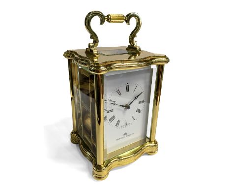 A Matthew Norman carriage clock with serpentine shaped case and striking the hours and half hours on a coiled gong, 14cm, com