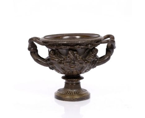 A late 19th Century bronze model of the Warwick vase 14cm high