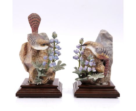 A Royal Worcester 'Canyon Wren with Wild Lupin' on a wood stand and one other similar (2)