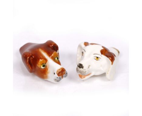 A Royal Worcester porcelain dog's head whistle and one other whistle (2)
