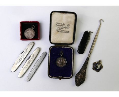 Penknives, pendants, Workington Junior cup etc.&nbsp;This bladed product is not for sale to people under the age of 18.&nbsp;