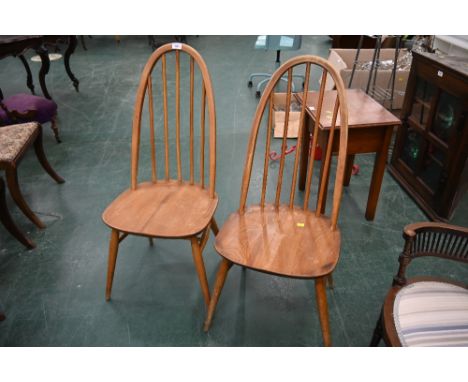 Two Ercol spindle back blonde chairs
