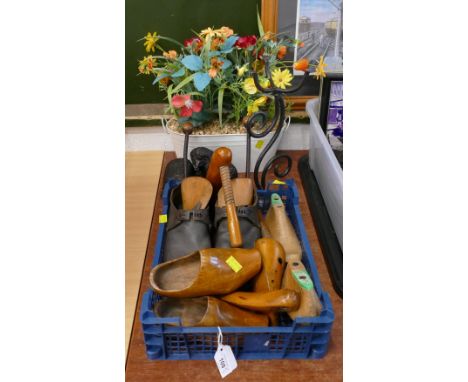 Vintage clogs, wooden shoe lasts, artificial flowers, hedgehog ornament and candle holder