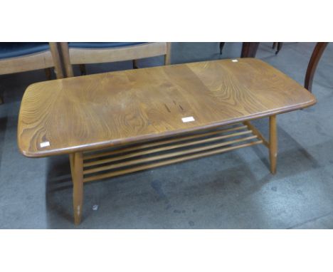 An Ercol Blonde elm and beech 459 model Windsor coffee table 