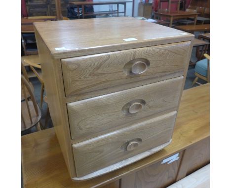 An Ercol Blonde ash bedside chest 