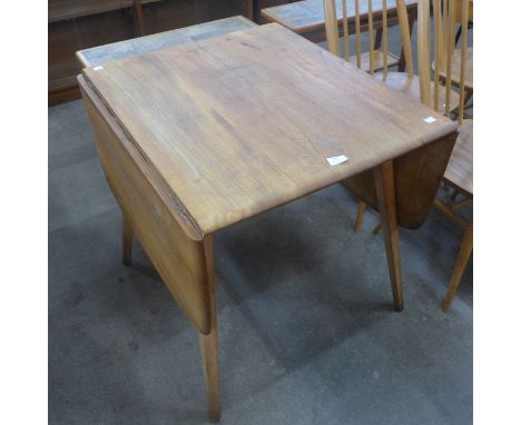 An Ercol Blonde elm and beech Windsor drop-leaf table 