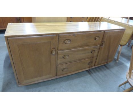 An Ercol Blonde elm Windsor sideboard 