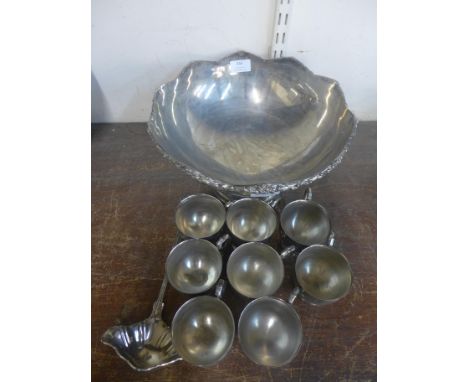 A plated punch bowl, with eight cups and a ladle 