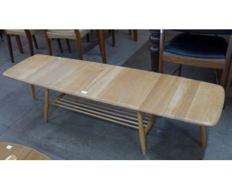 An Ercol Blonde ash 456 model Windsor extending coffee table 