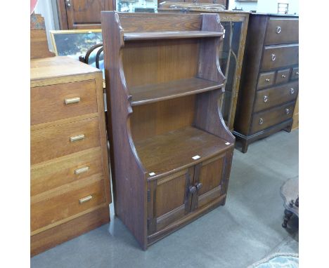 An Ercol Golden Dawn ash open bookcase 