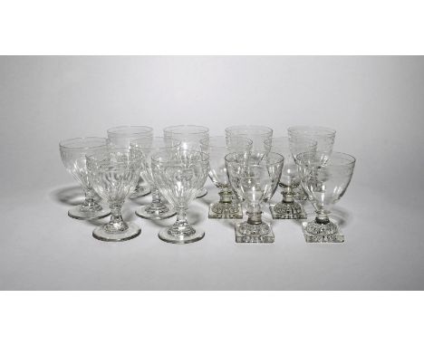 Two sets of six glass rummers  early 19th century, with rounded funnel bowls, engraved with delicate stars and polished ovals
