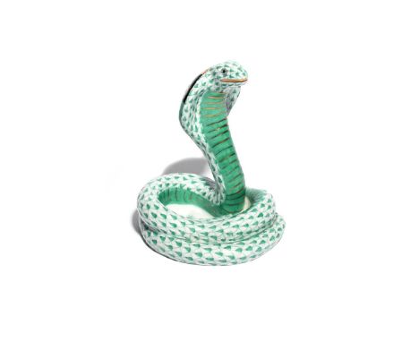 A Herend figure of a cobra  modern, the hooded snake coiled on itself with head raised, decorated in a green scale design wit